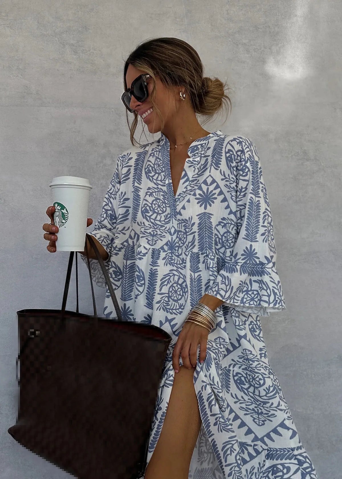 Vestido midi estampado con escote en V y manga tres cuartos