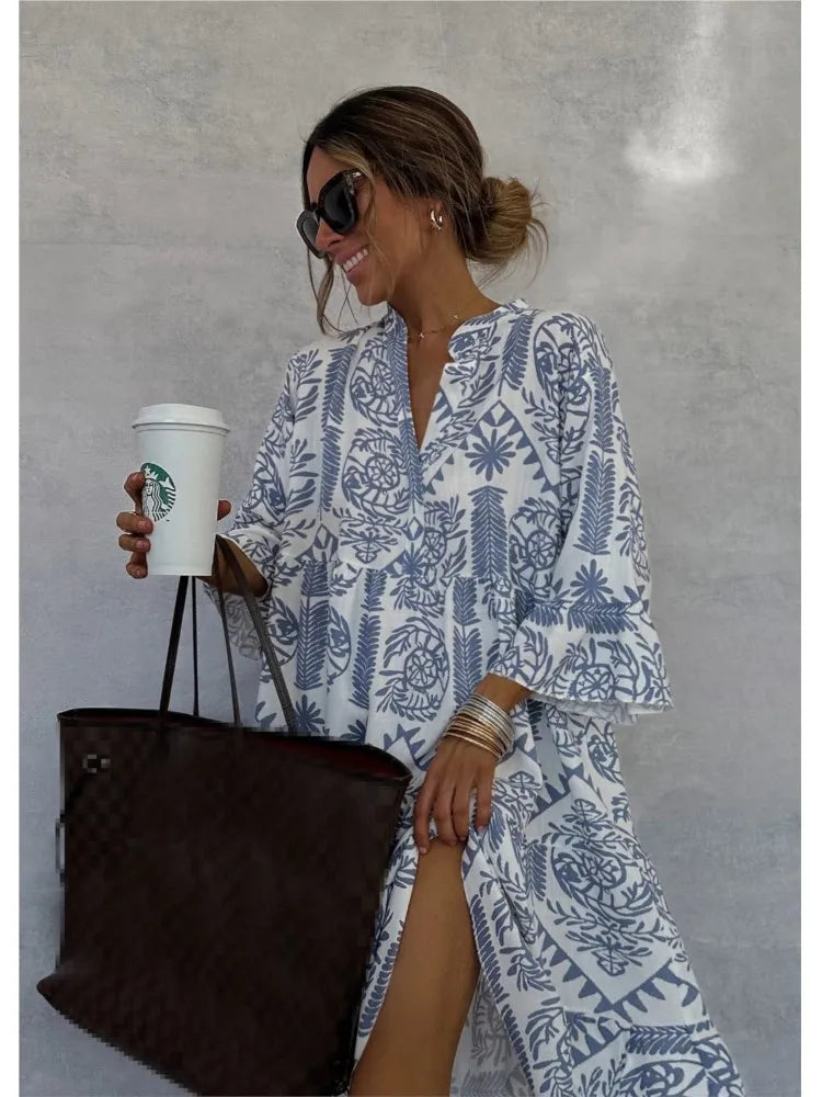 Vestido midi estampado con escote en V y manga tres cuartos